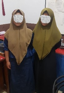 Dua Gadis Kembar Diamankan Polisi karena Penipuan